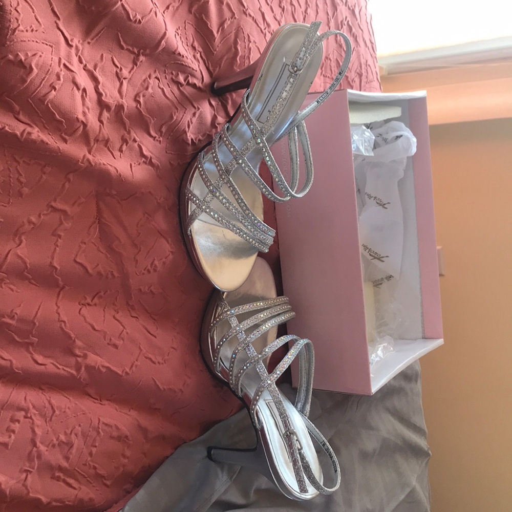 Size 7 silver heels